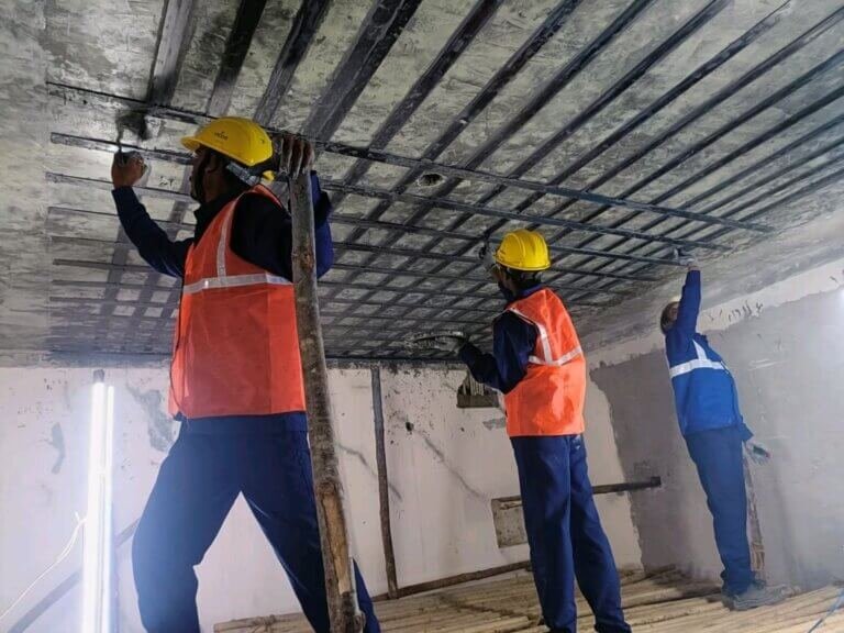 Carbon fibre wrapping for slabs to strengthen RCC concrete structures