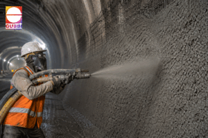 Worker applying shotcrete on concrete wall showing wet mix vs dry mix shotcrete method for structural repair and tunnel construction